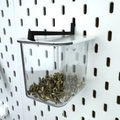 Container Ikea Skadis perforated wall hold-down device